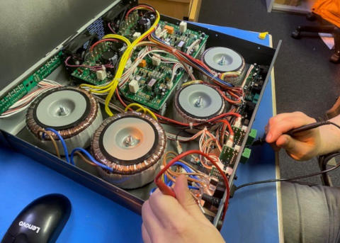 Close up of a speaker system repair